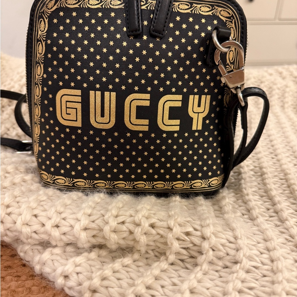 Gucci Black and Gold Star Patterned Bag